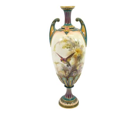 A Hadley Worcester pedestal vase, ovoid Grecian form with twin horn handles, painted with bird in flight in floral garden set