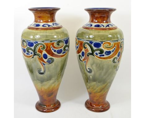 Mark V Marshall for Royal Doulton, a pair of large stoneware vases, circa 1904, inverse baluster form, tubelined Art Nouveau 
