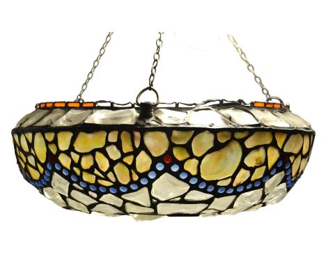 An early 20th century leaded glass and mother of pearl pendant light shade, circa 1915, swags of shell, beaded with blue cabo