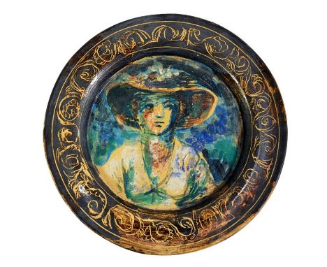 Quentin Bell, a studio pottery plate, incised and painted with a portrait of a woman in a hat, within scroll border, incised 