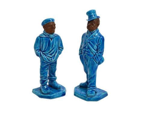 A pair of Royal Worcester blue glazed figures, top hat and sailor, 1865, impressed marks and diamond marks, 16cm high (2)
