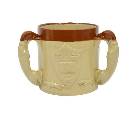 A Bourne Denby tyg, relief moulded with the arms of Oxford University above a band of hunting dogs, the handles modelled as g
