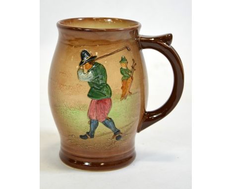 A Royal Doulton Golfing Kingsware mug, decorated with figures playing golf, printed marks to base, numbered, 15cm high