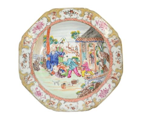 A Chinese famille rose dish, Qianlong, circa 1750, octagonal section, the central scene of children playing in a garden, with