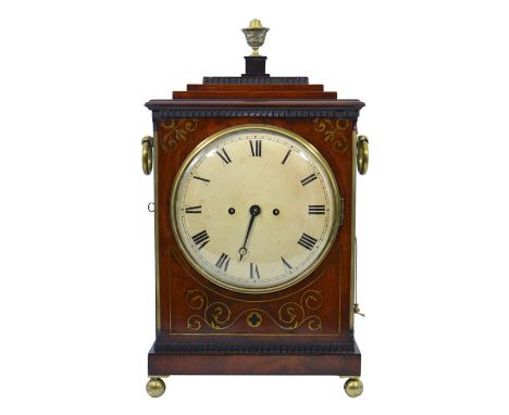 A William IV mahogany and brass inlaid bracket clock, circa 1835, the 8 inch enamelled dial with Roman numerals, within a fol