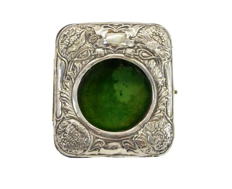 An Arts and Crafts silver watch holder, easel form, embossed in the Art Nouveau style with poppies and central vacant cartouc