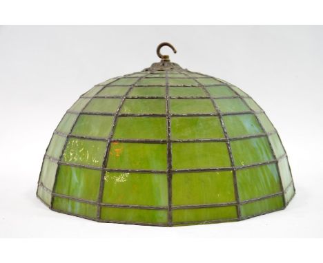 An American leaded glass pendant light shade, circa 1910, in the Tiffany style, marbled green glass panes, 40.5cm diameter