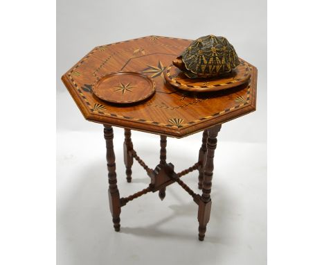 An Anglo Indian colonial tortoise tea caddy on stand, together with matching folding tea table and tray, hardwood with boxwoo