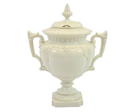 A Royal Worcester Blanc de Chine pedestal vase and cover, relief moulded lobed ovoid form with twin angular handles and retic