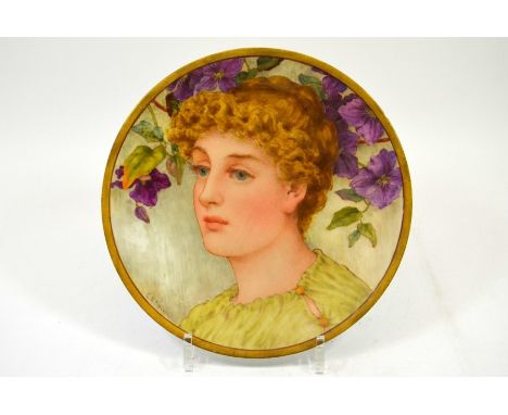 Charles Horne Spiers for Minton, a painted plate with portrait of a PreRaphaelite woman with clematis, signed C H Spiers and 