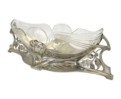 WMF, a large Jugendstil silver plated and glass centrepiece, twin handled boat form with reticulated holly leaf and berry des