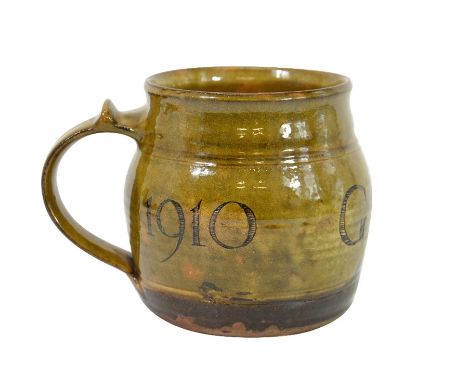 Michael Cardew for Winchcombe, a studio pottery commemorative tankard, George V silver jubilee 1935, incised with Royal cyphe