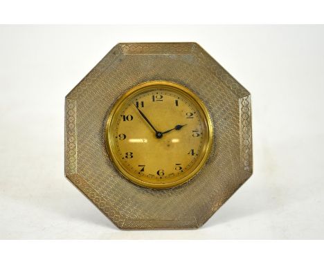 An Art Deco silver timepiece, engine turned octagonal form with Arabic numerals, Docker &amp; Burn Ltd., Birmingham 1927, 10c