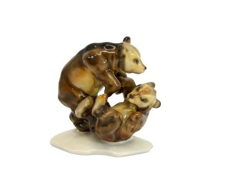 A Hutschenreuther figure of two bears playing, printed marks and label, 11cm high