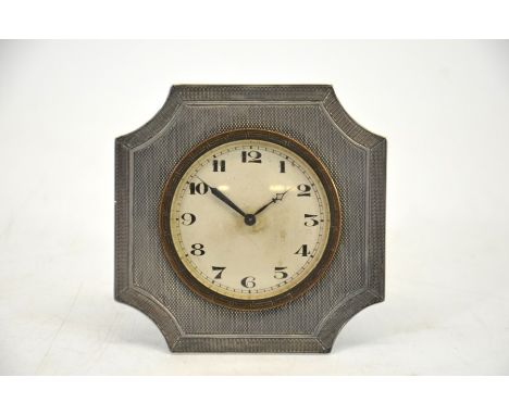 An Art Deco silver timepiece, engine turned chamfered square design, Robert Pringle and Sons, Birmingham 1928, 8.3cm square