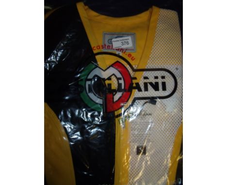 Brand new Castellani ex shop stock sealed in packet yellow, black & white shooting vest R.H size 44