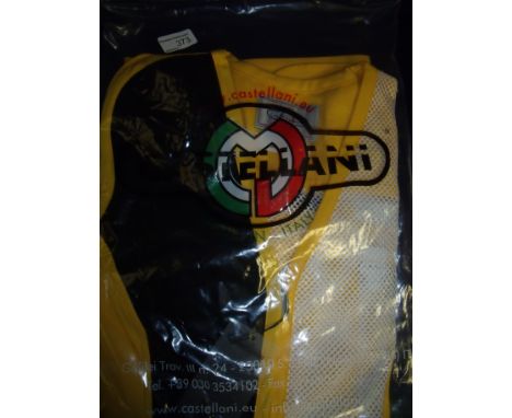 Brand new Castellani ex shop stock sealed in packet yellow, black & white shooting vest R.H size 44