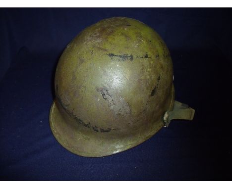 American issue steel helmet with liner and chin strap