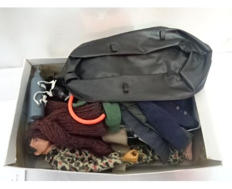 A box of Action Man accessories