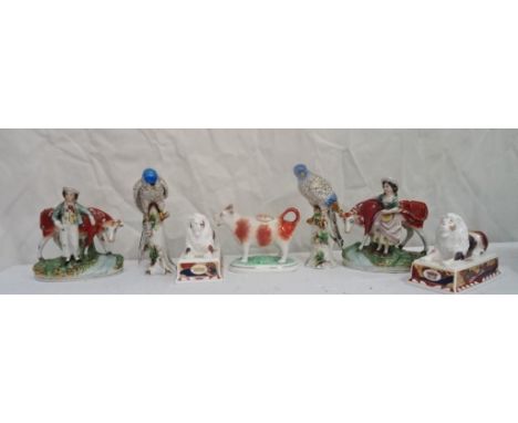 Qty ceramics to include Staffodshire figures, Parrots & pair royal Worcester trafalgar lions