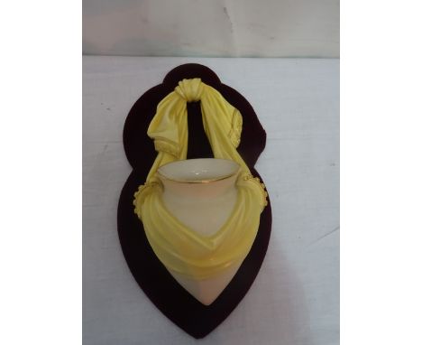 A Royal Worcester amphora wall pocket on velvet back