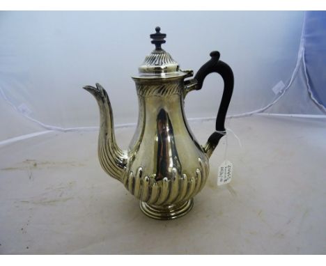 A Victorian silver coffee pot by Thomas Bradbury, London 1881, baluster form with spiral hunting
