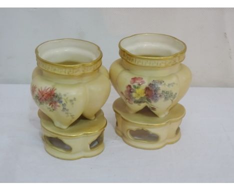A pair of Royal Worcester squat vases (one A/F)