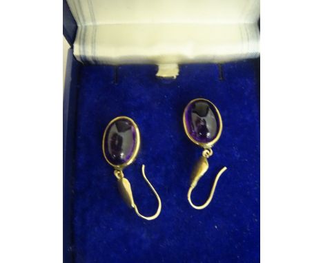 A pair of 9ct cabochon amethyst drop earrings on loop suspension