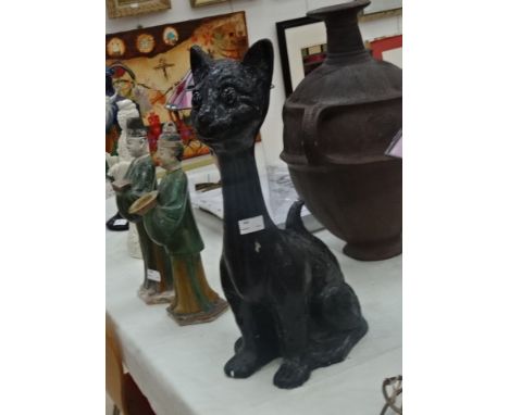 A large Victorian black painted model of a cat, possibly a shop display