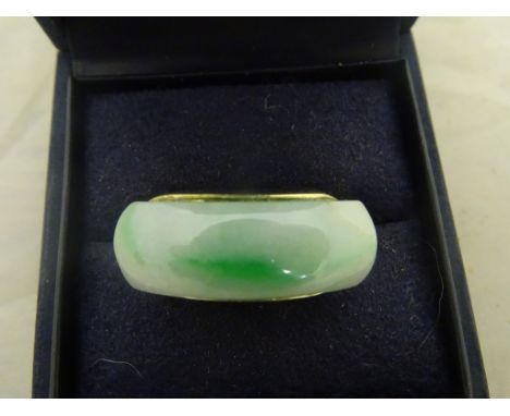 A 14k jade set ring 