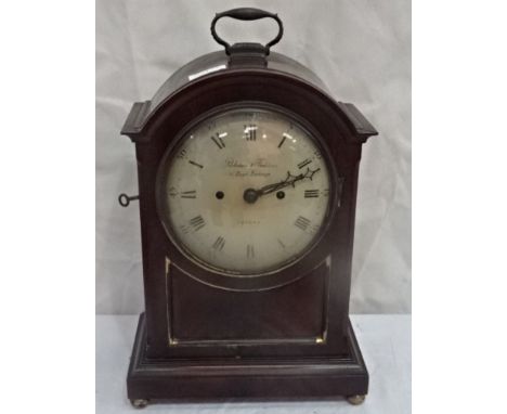 A Regency mahogany break arch bracket clock, the enamel dial with maker's name Parkinson & Frodsham, 15 Royal Exchange, Londo