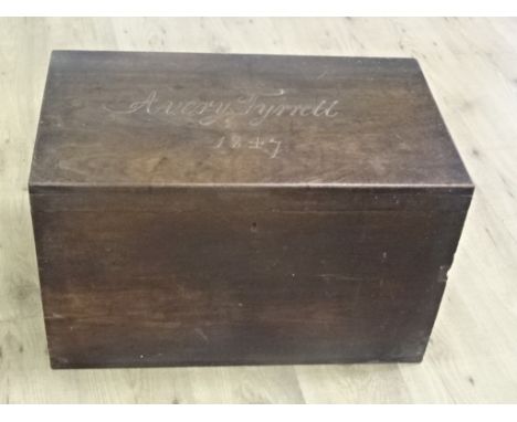 A large wooden camphor trunk, the top carved "Avery Typrell, 1847"