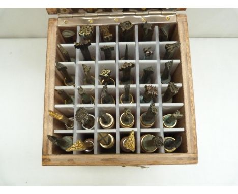 Book Binding Equipment. &nbsp;Wooden box containing 36 book binder's centre &amp; corner gold finishing hand tools. 