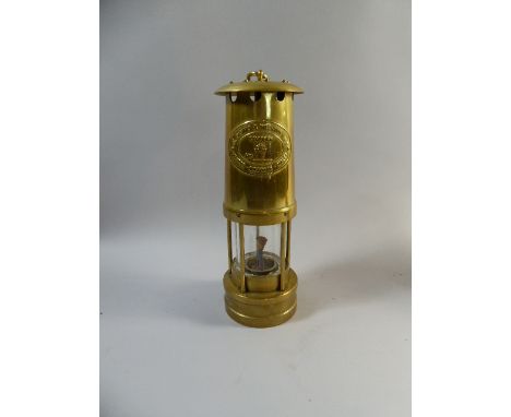 A Brass Miners Safety Lamp by Thomas and Williams Ltd  
