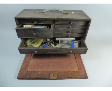 An Edwardian Engineers Tool Cabinet Containing Various Tools and Fittings Having Eight Graduated Doors and Removable Front, 4