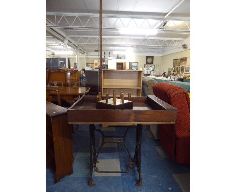 A Vintage Bar Skittles Game Set on Cast Iron Singer Treadle Sewing Machine Stand