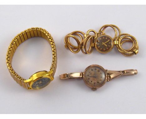 A mixed lot comprising a vintage lady's 9 carat gold wrist watch and bracelet, gross weight 15.8 gms, together with two fashi