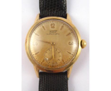 A gent's 14 carat gold Tissot wrist watch, automatic movement, case approx 33mm wide.