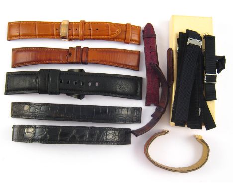 A quantity of vintage watch straps.