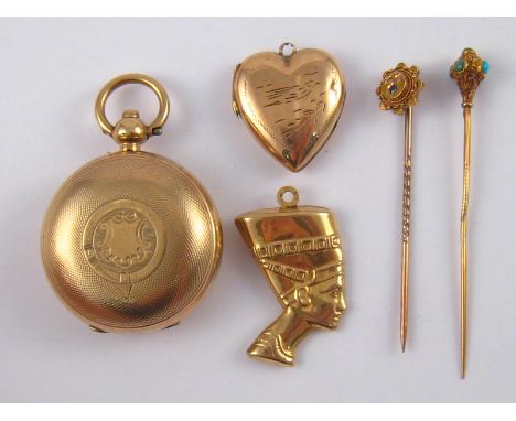 A mixed lot comprising an Egyptian style pendant marked 375 (1.9 gms), a gold filled sovereign case, a gold back and front lo