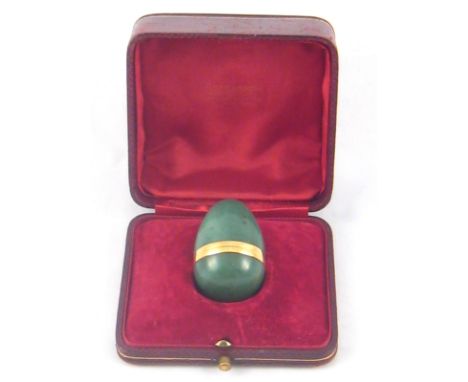 An aventurine and gold egg shape box, apparently unmarked, approx 5cm, in vintage Boucheron case. 
