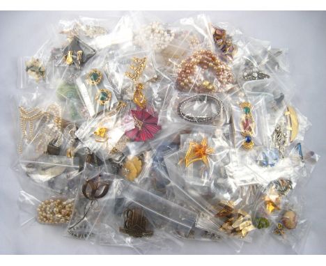 A large quantity of mixed vintage costume jewellery.