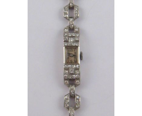 A platinum and diamond lady's wrist watch and bracelet, circa 1920's, estimated total diamond content approx 4 carats, bracel