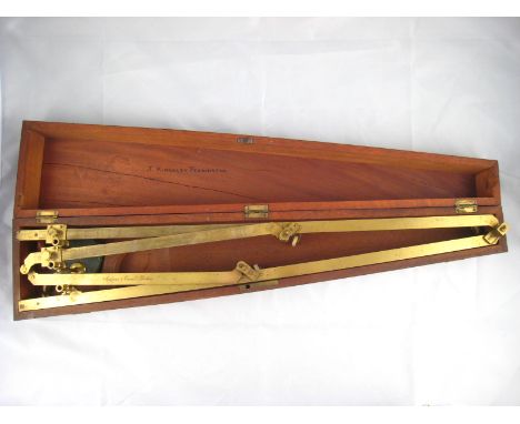 An early 19th. century brass pantograph with bone wheels and calibrated scales by Spencer and Company, London. in fitted maho
