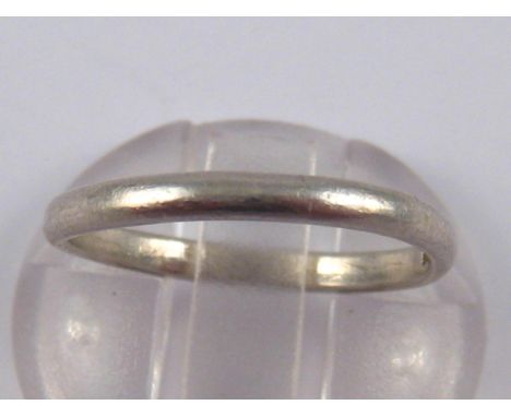 A white metal (tests platinum) ring, size K, 2.7 gms.
