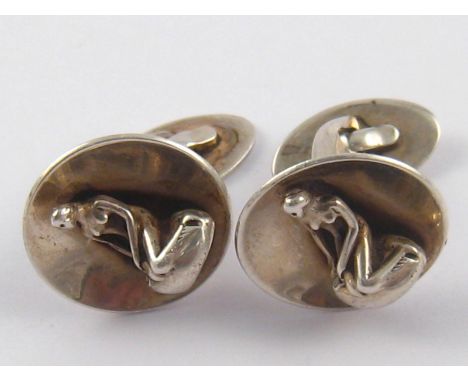 A pair of Danish silver cufflinks, marked Sterling Denmark, Handmade, and Brdr. Bj for Brdr. Bjerring , Copenhagen, circa 197