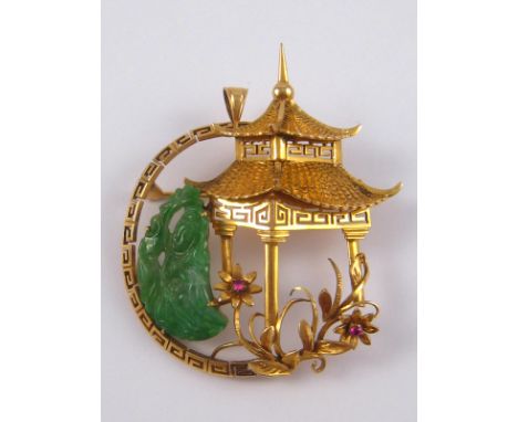 A Chinese yellow metal (tests 18 carat gold) brooch with pendant fitting, designed as a pagoda and set with a carved jade, br