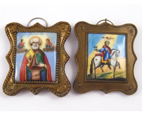 Two similar late 19th. century small Russian enamel icons, each 4x5cm. in brass frames, one St Tryphon, the other St Michael 