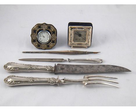 A mixed lot. A silver dip pen and a silver handled paperknife, both marked 830S, and a silver handled carving knife and fork,