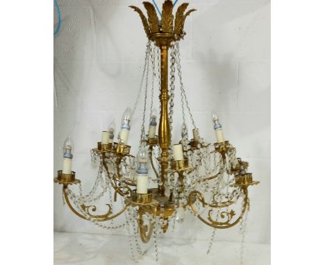 A vintage crystal and gilt metal twelve branch chandelier, 80cm diameter, 90cm height.
